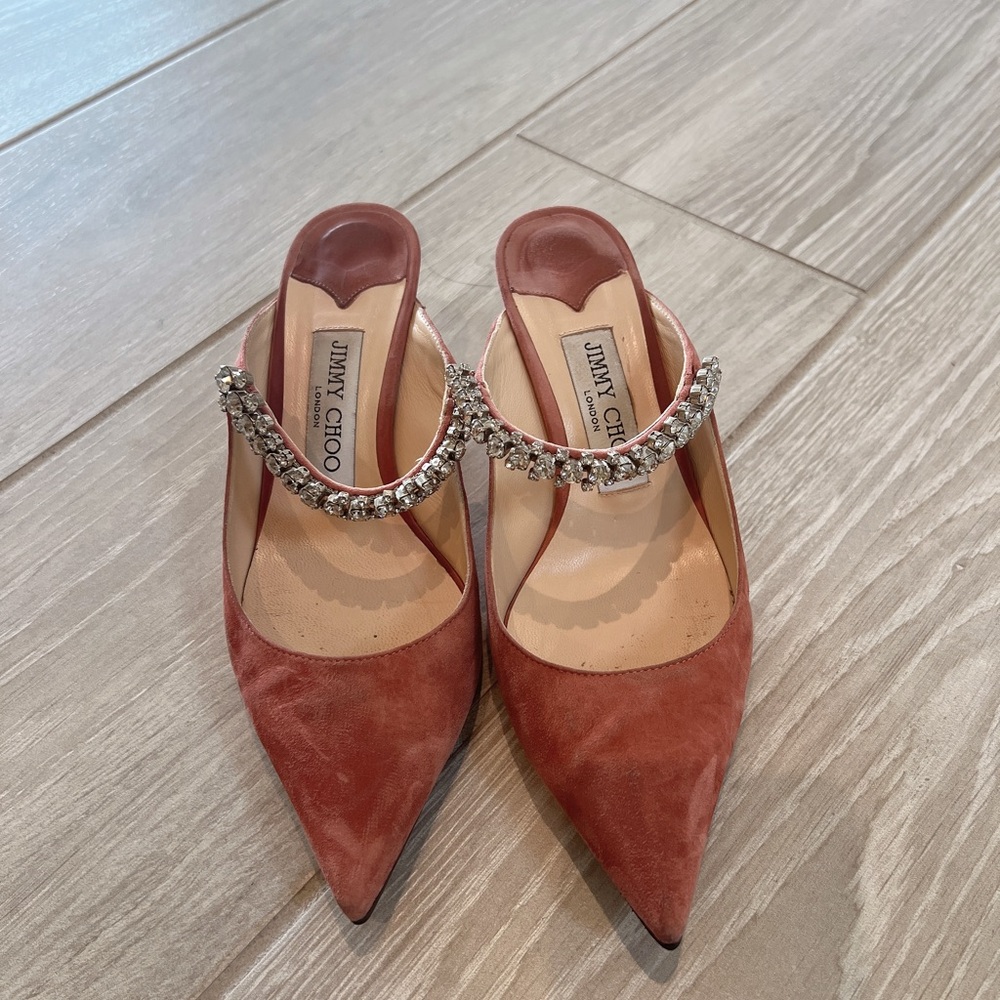 Jimmy Choo 90% new.